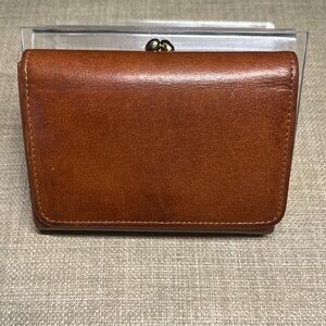 Vintage Coach Kisslock Water Buffalo trifold wallet in British tan